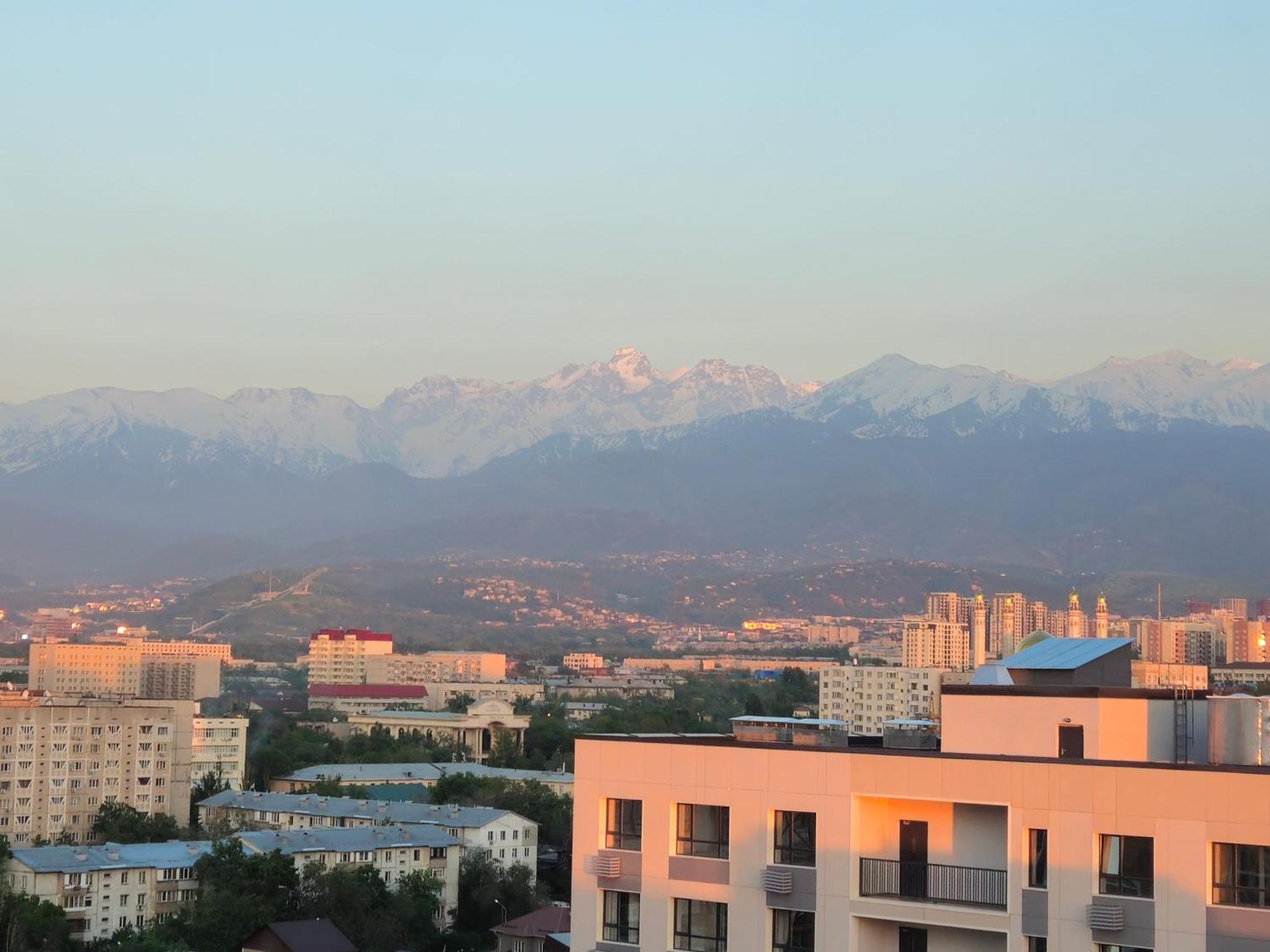 Alpine Serenity Deluxe With Mountain Views Near The Adk Shopping Center And Sairan Metro Station Apartment Almaty
