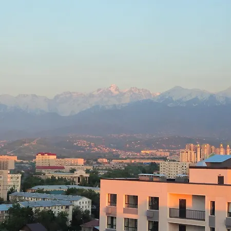 Alpine Serenity Deluxe Apartment With Mountain Views Near The Adk Shopping Center And Sairan Metro Station Almaty Exterior photo